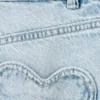 Jeans a gamba larga con tasche a forma di cuore Jeans a gamba larga con tasche a forma di cuore