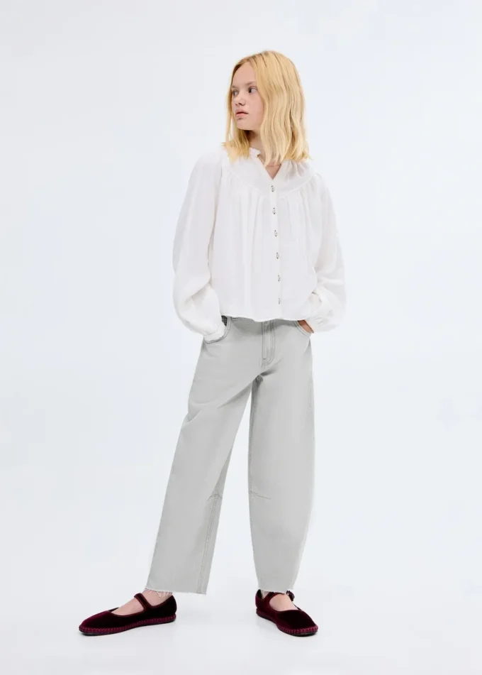 Jeans a vita media con taglio a palloncino