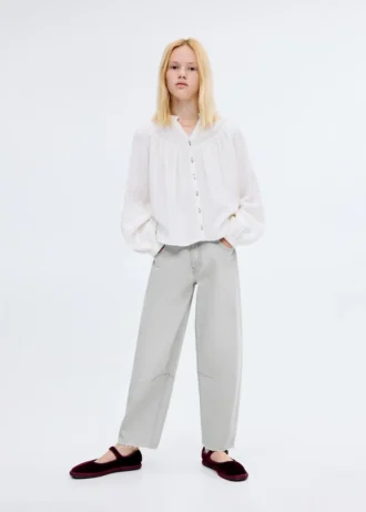 Jeans a vita media con taglio a palloncino