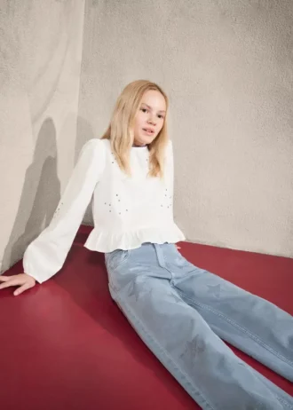 Jeans con dettagli a stelle glitterate