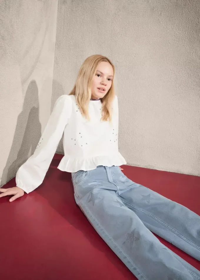 Jeans con dettagli a stelle glitterate Jeans con dettagli a stelle glitterate