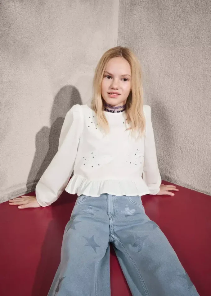 Jeans con dettagli a stelle glitterate Jeans con dettagli a stelle glitterate