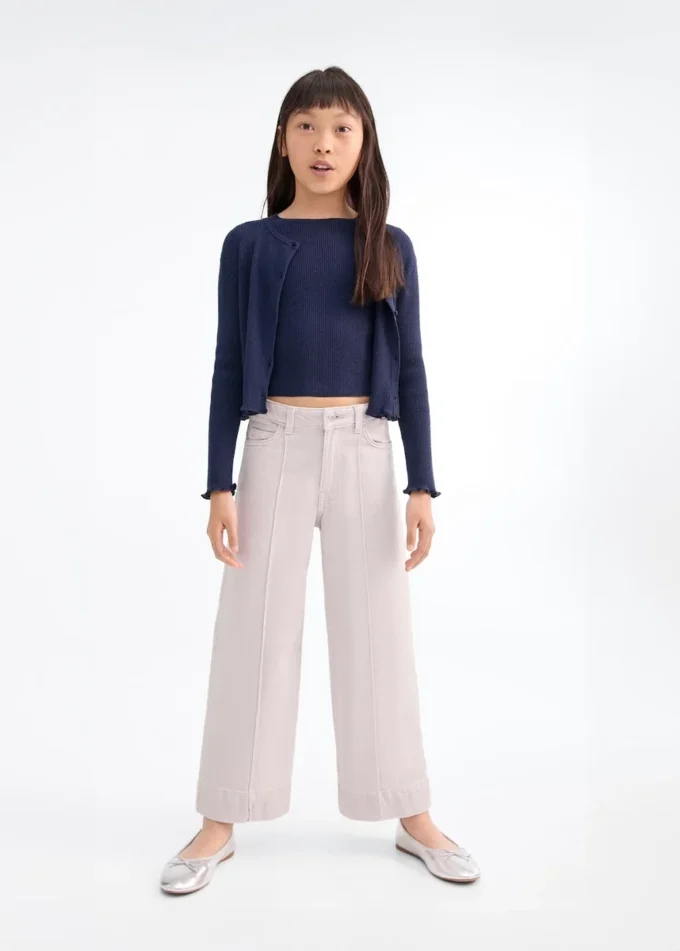 Jeans culotte con cuciture a vista