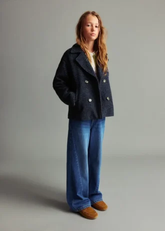 Jeans culotte con cuciture a vista