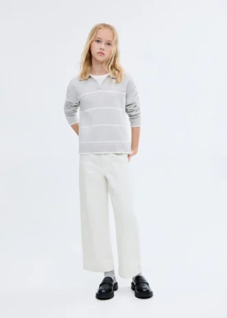 Jeans culotte con cuciture a vista