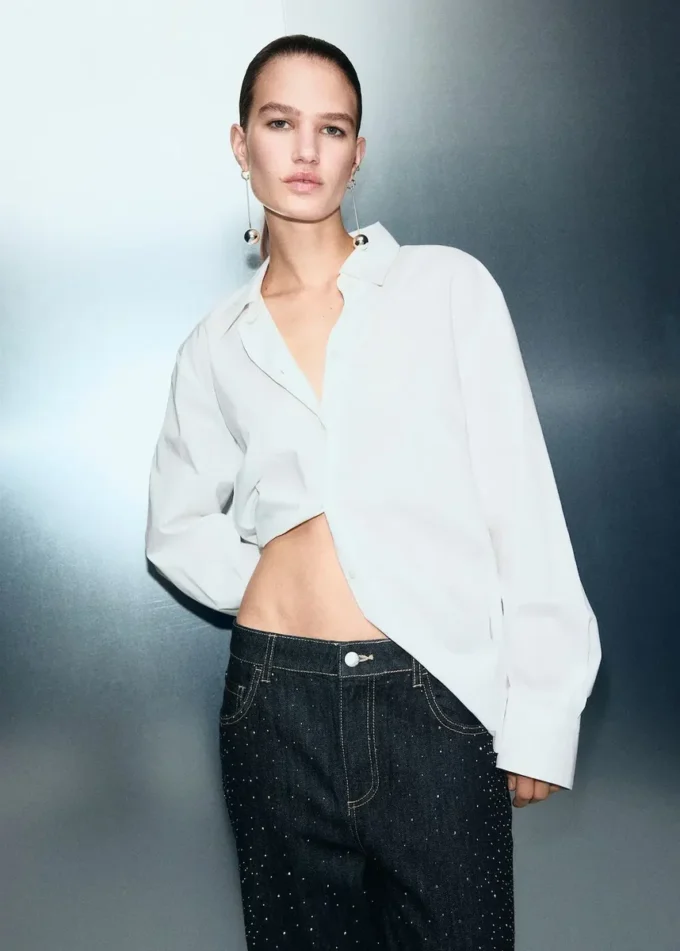 Jeans dritti con dettagli in strass Jeans dritti con dettagli in strass