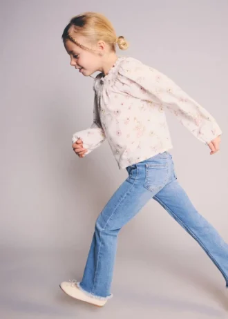 Jeans skinny a vita bassa con orlo sfrangiato