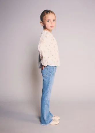 Jeans skinny a vita bassa con orlo sfrangiato