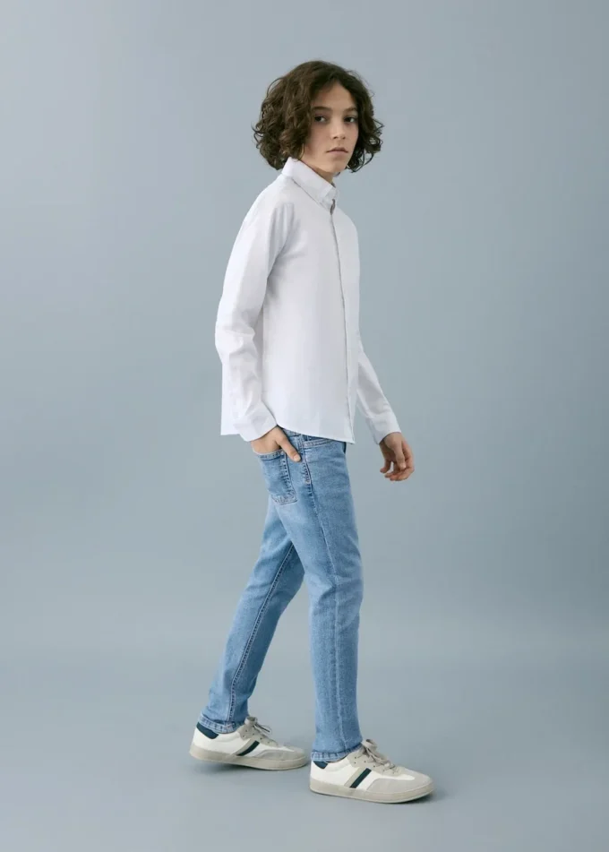 Jeans slim fit a vita media Jeans slim fit a vita media