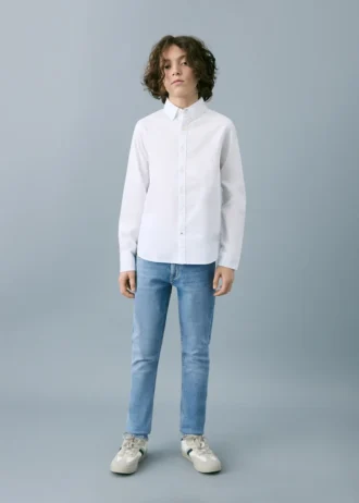 Jeans slim fit a vita media