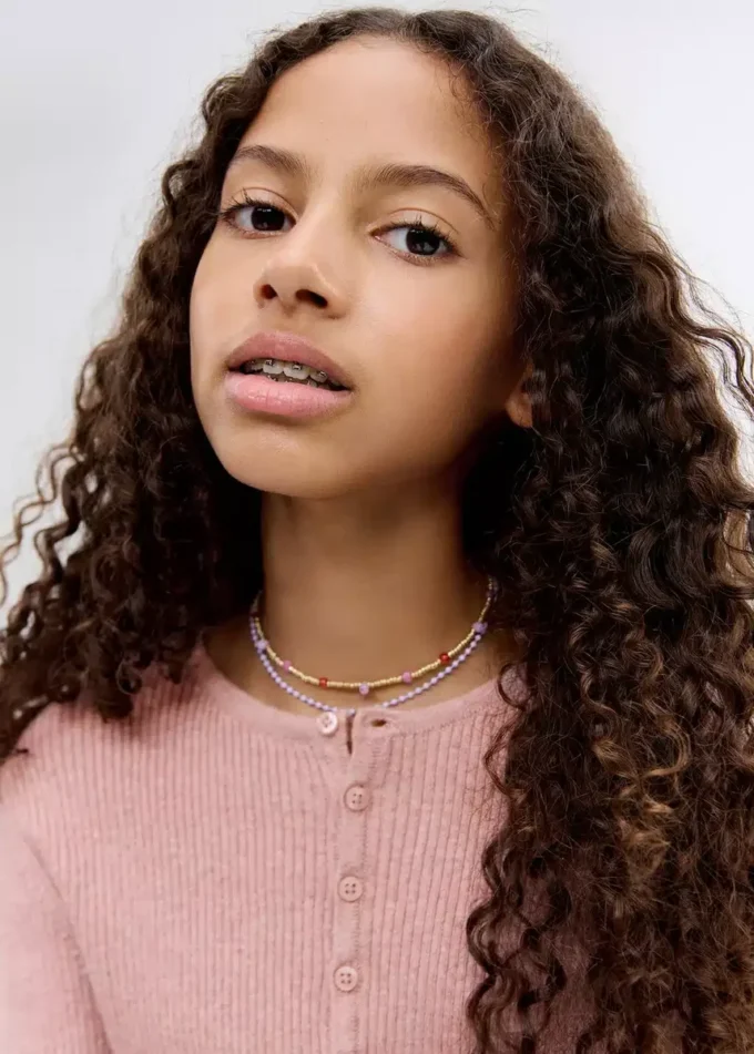 Maglione a costine con bottoni