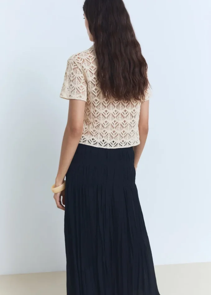 Maglione a maniche corte lavorato all’uncinetto Maglione a maniche corte lavorato all’uncinetto