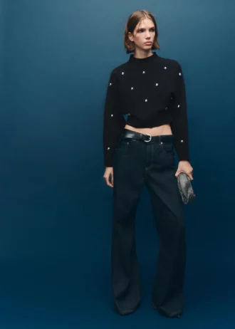 Maglione con collo a imbuto e sfere