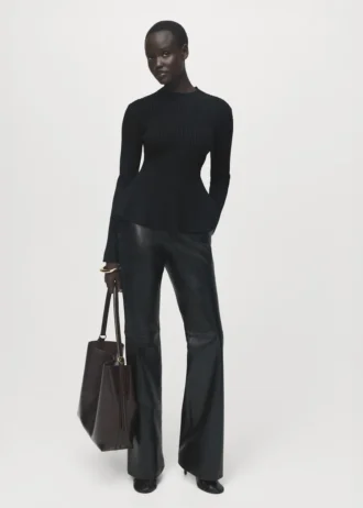 Maglione con peplo a costine