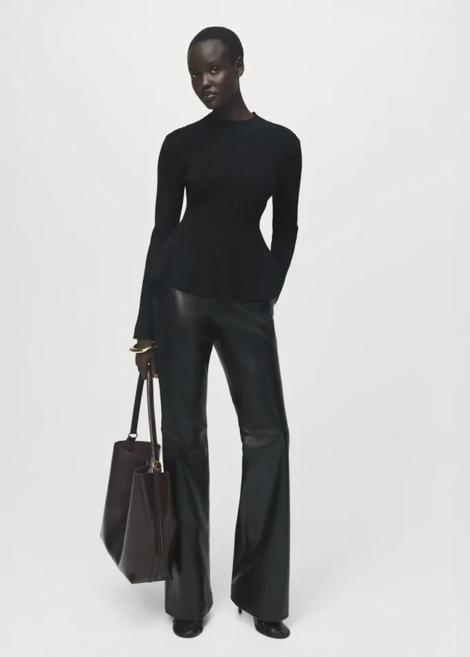 Maglione con peplo a costine Maglione con peplo a costine