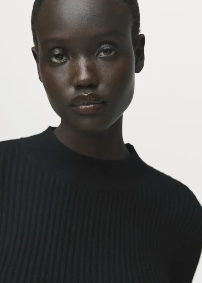 Maglione con peplo a costine Maglione con peplo a costine