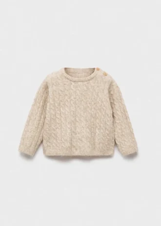 Maglione lavorato a trecce