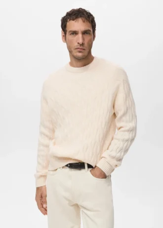 Maglione lavorato a trecce