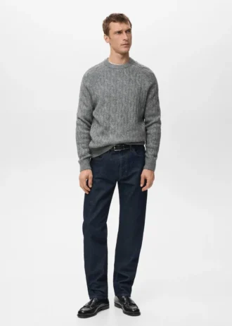 Maglione lavorato a trecce