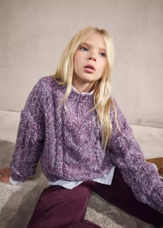 Maglione lavorato a trecce