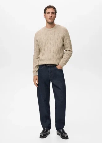 Maglione lavorato a treccia