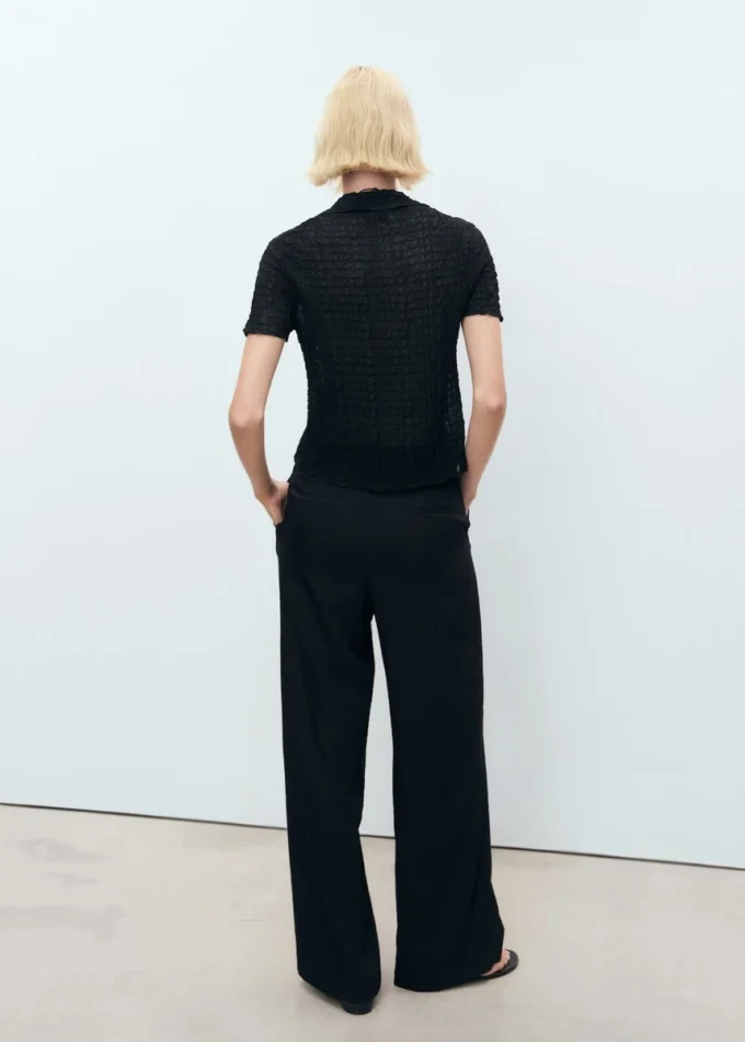 Pantaloni a gamba larga con piega Pantaloni a gamba larga con piega