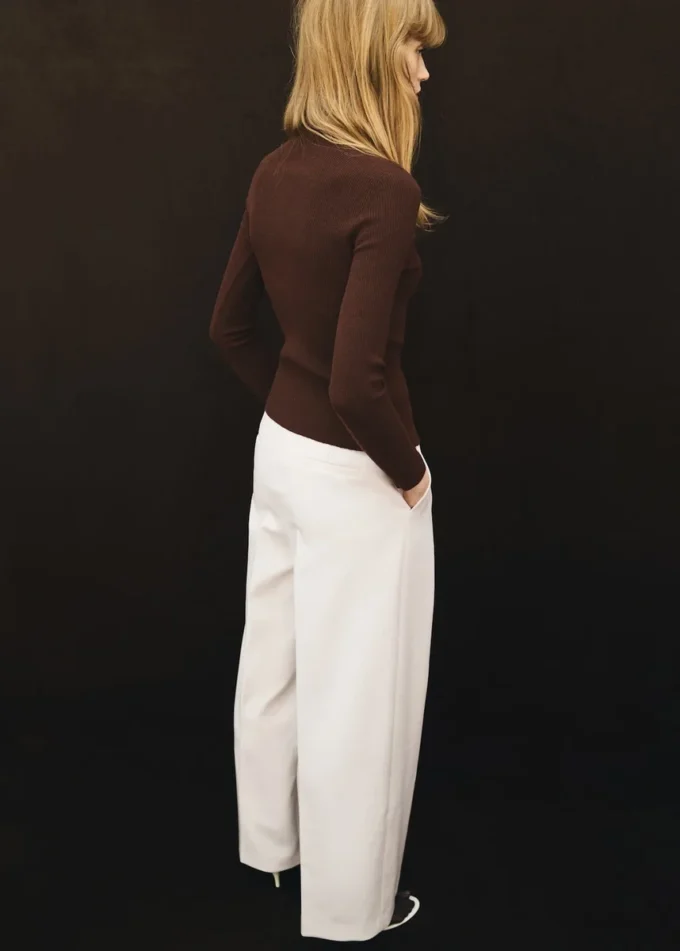 Pantaloni a pieghe con zip Pantaloni a pieghe con zip