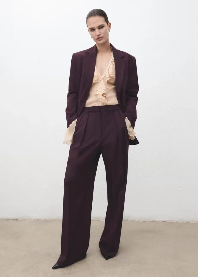 Pantaloni a vita media con piega e gamba larga Pantaloni a vita media con piega e gamba larga