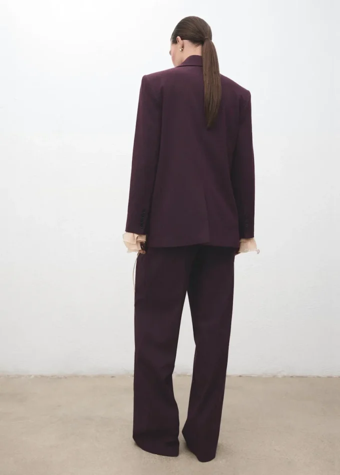 Pantaloni a vita media con piega e gamba larga Pantaloni a vita media con piega e gamba larga