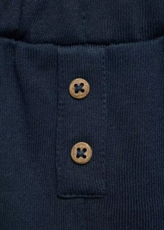 Pantaloni dritti con bottoni