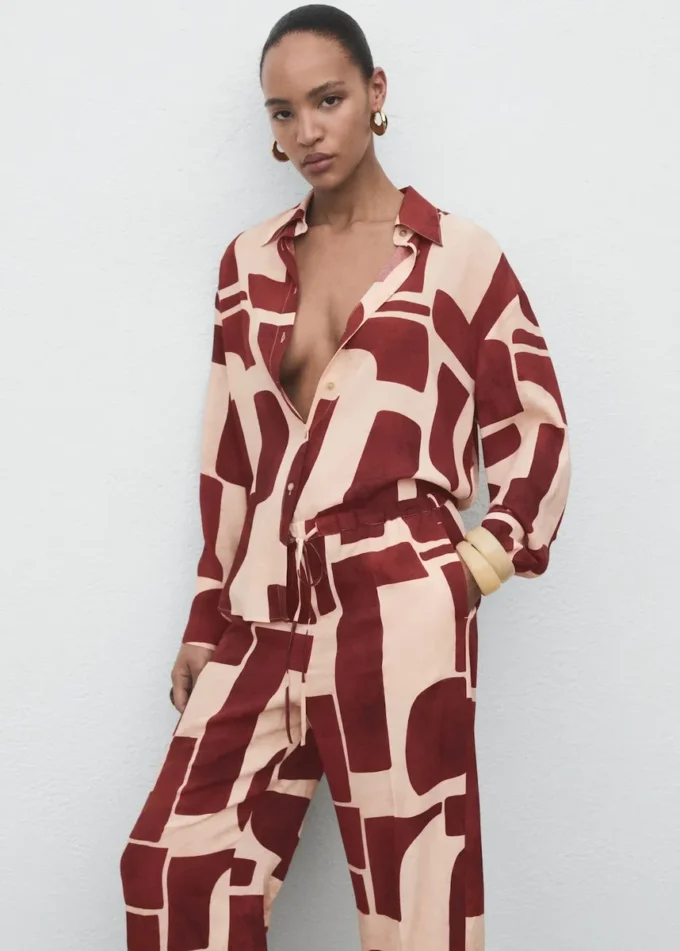 Pantaloni fluidi con motivo geometrico Pantaloni fluidi con motivo geometrico