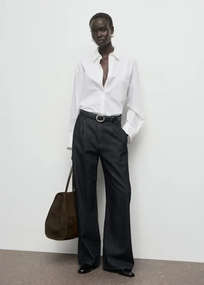 Pantaloni in denim a gamba larga con pieghe Pantaloni in denim a gamba larga con pieghe