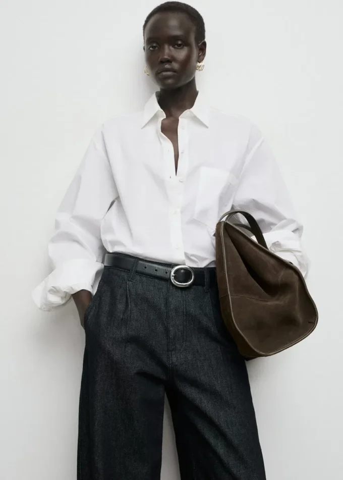 Pantaloni in denim a gamba larga con pieghe Pantaloni in denim a gamba larga con pieghe