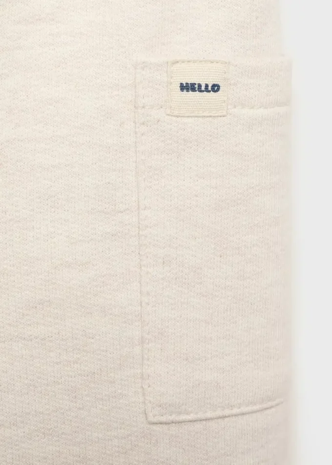 Pantaloni jogging cargo con dettaglio bottoni Pantaloni jogging cargo con dettaglio bottoni