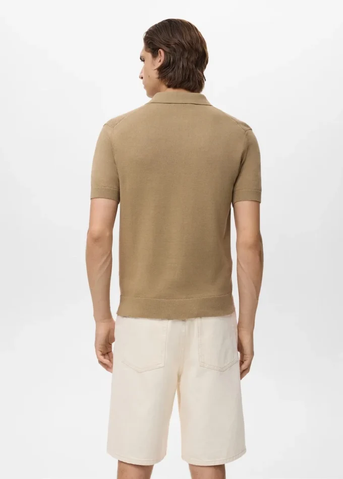 Polo in maglia con zip e dettagli in pizzo Polo in maglia con zip e dettagli in pizzo