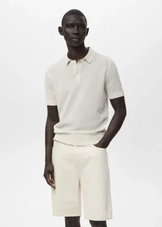 Polo in maglia di cotone con motivo traforato