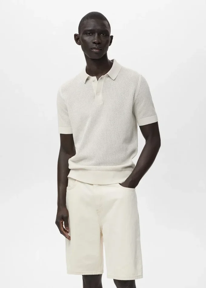 Polo in maglia di cotone con motivo traforato Polo in maglia di cotone con motivo traforato