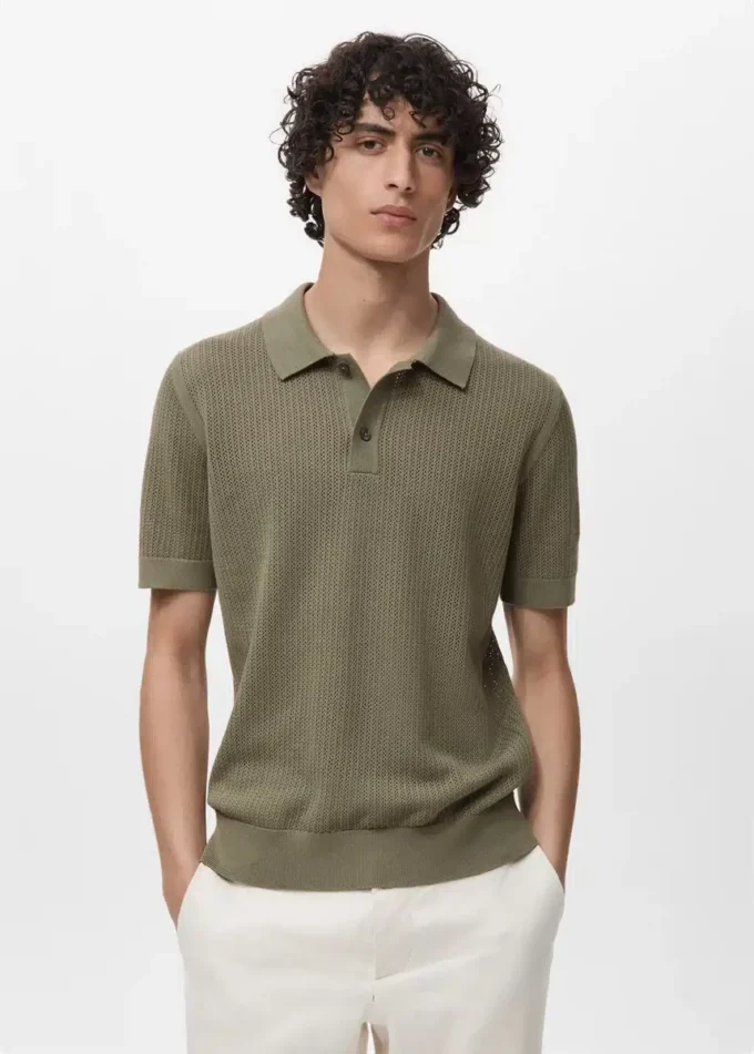 Polo in maglia di cotone con motivo traforato Polo in maglia di cotone con motivo traforato