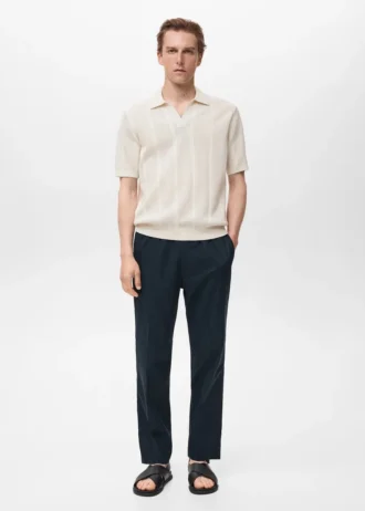 Polo in maglia di cotone con motivo traforato