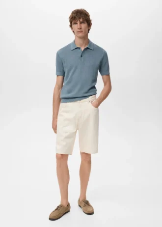 Polo in maglia di cotone con motivo traforato Polo in maglia di cotone con motivo traforato