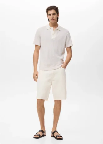 Polo in maglia di cotone con motivo traforato