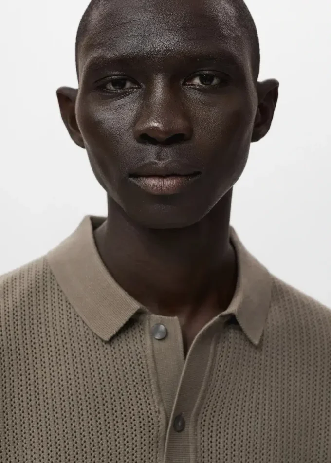 Polo in maglia di cotone con motivo traforato Polo in maglia di cotone con motivo traforato