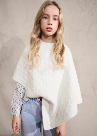 Poncho lavorato a trecce