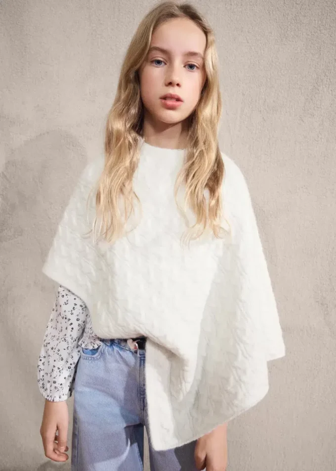 Poncho lavorato a trecce