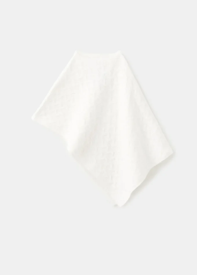 Poncho lavorato a trecce