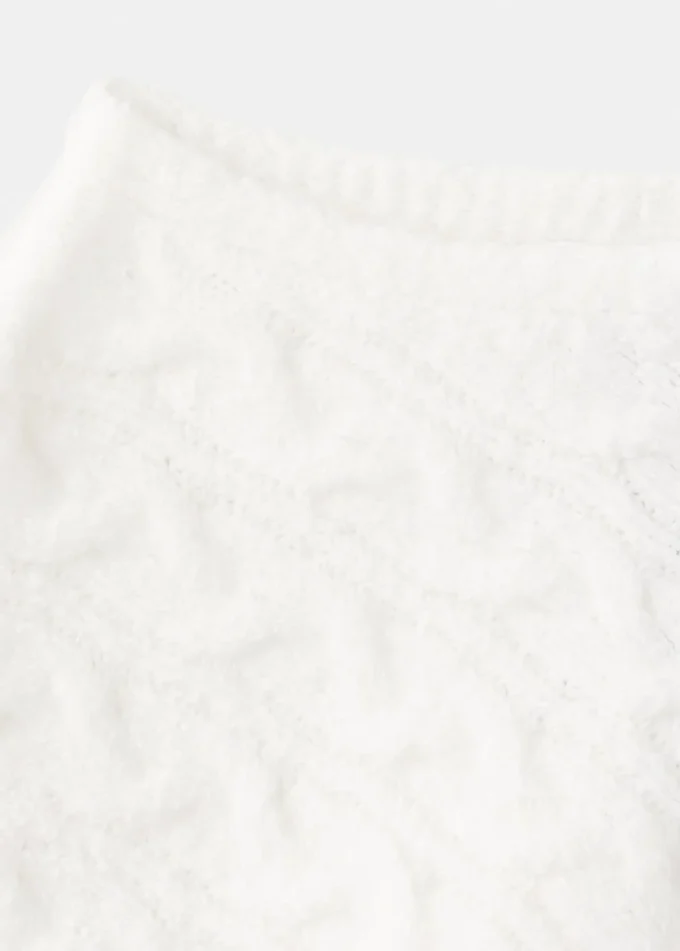 Poncho lavorato a trecce