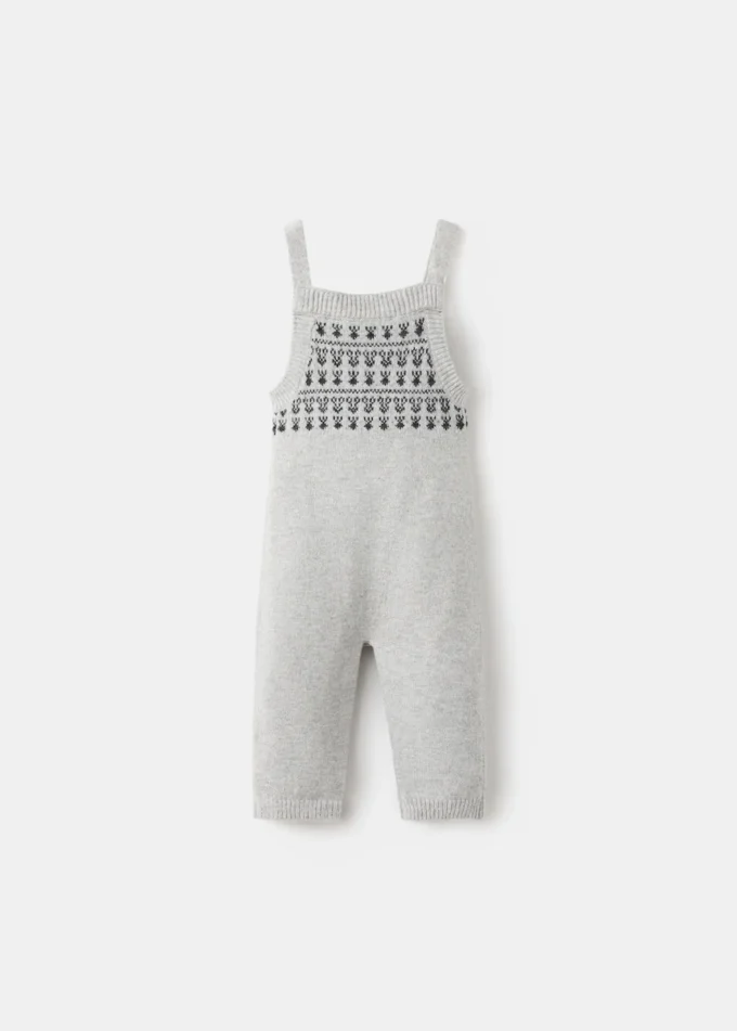 Salopette con bordi ricamati