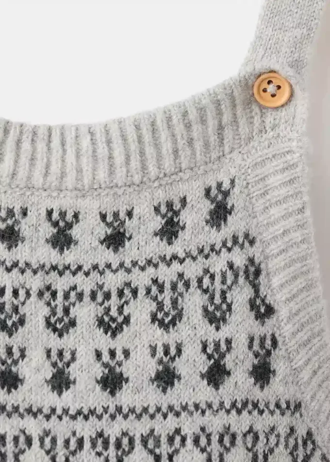 Salopette con bordi ricamati