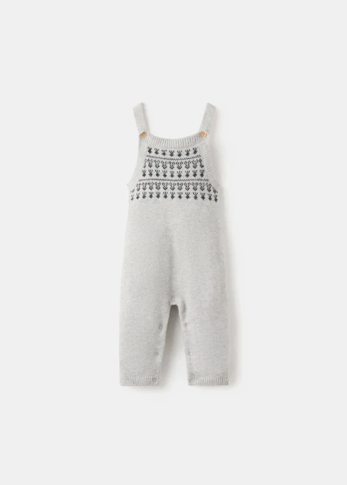 Salopette con bordi ricamati