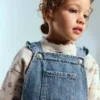 Salopette in denim con volant Salopette in denim con volant